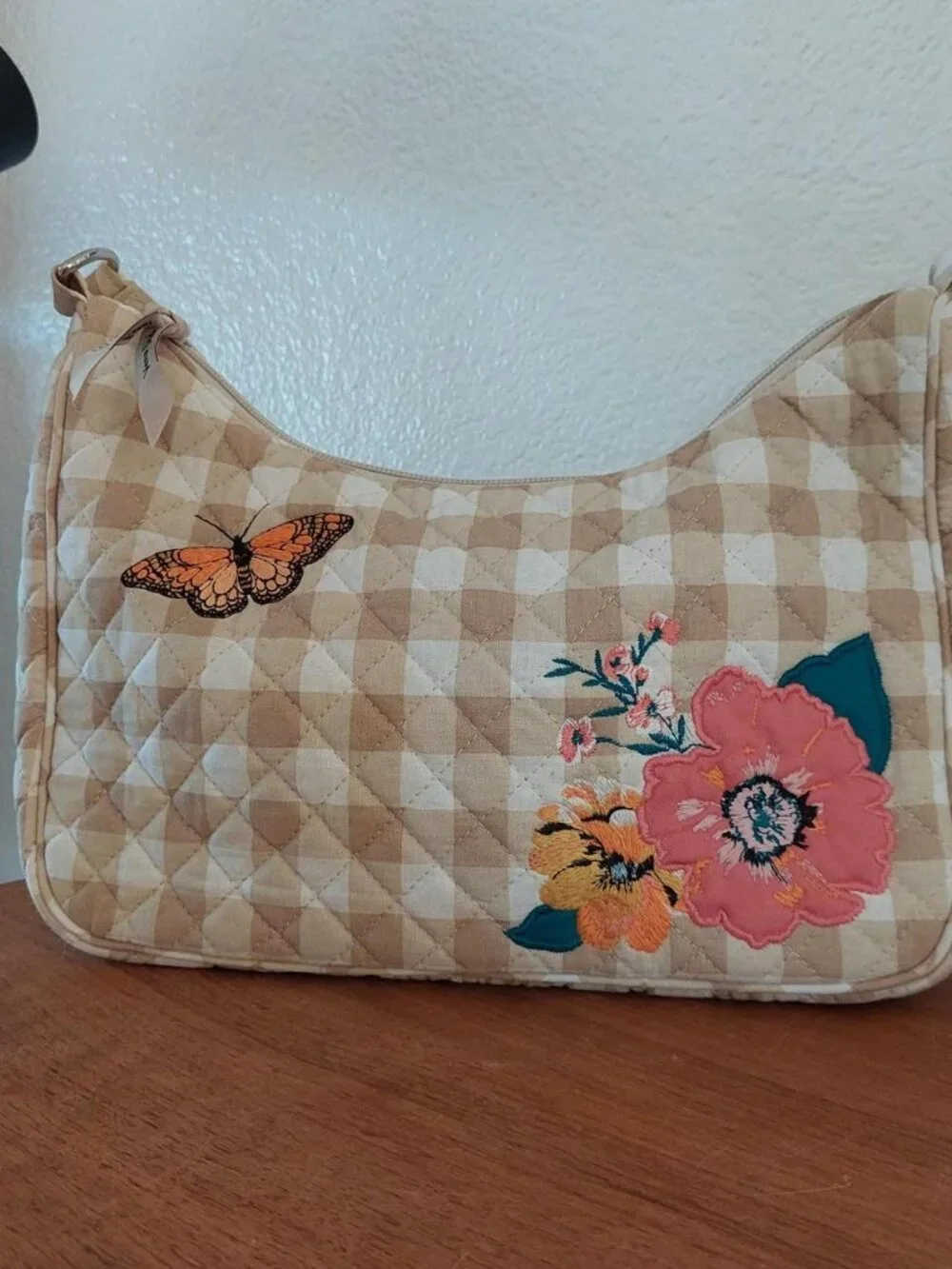 Vera Bradley Frannie Crescent Crossbody peach blossom picnic  is made from quilt